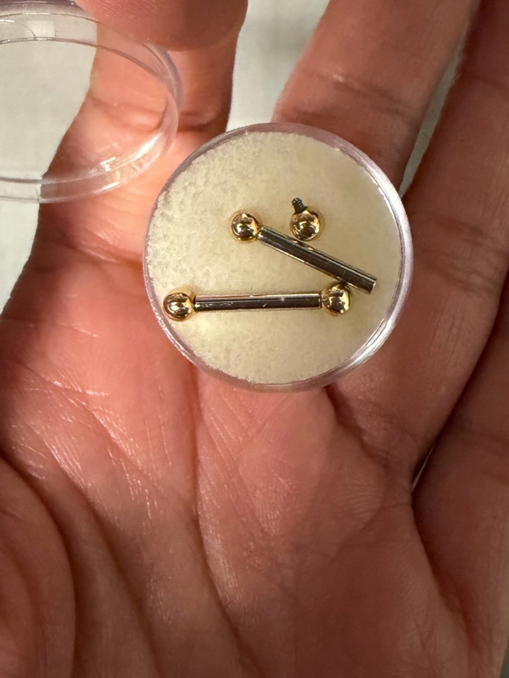 10k Gold nipple rings with sterling silver bars.